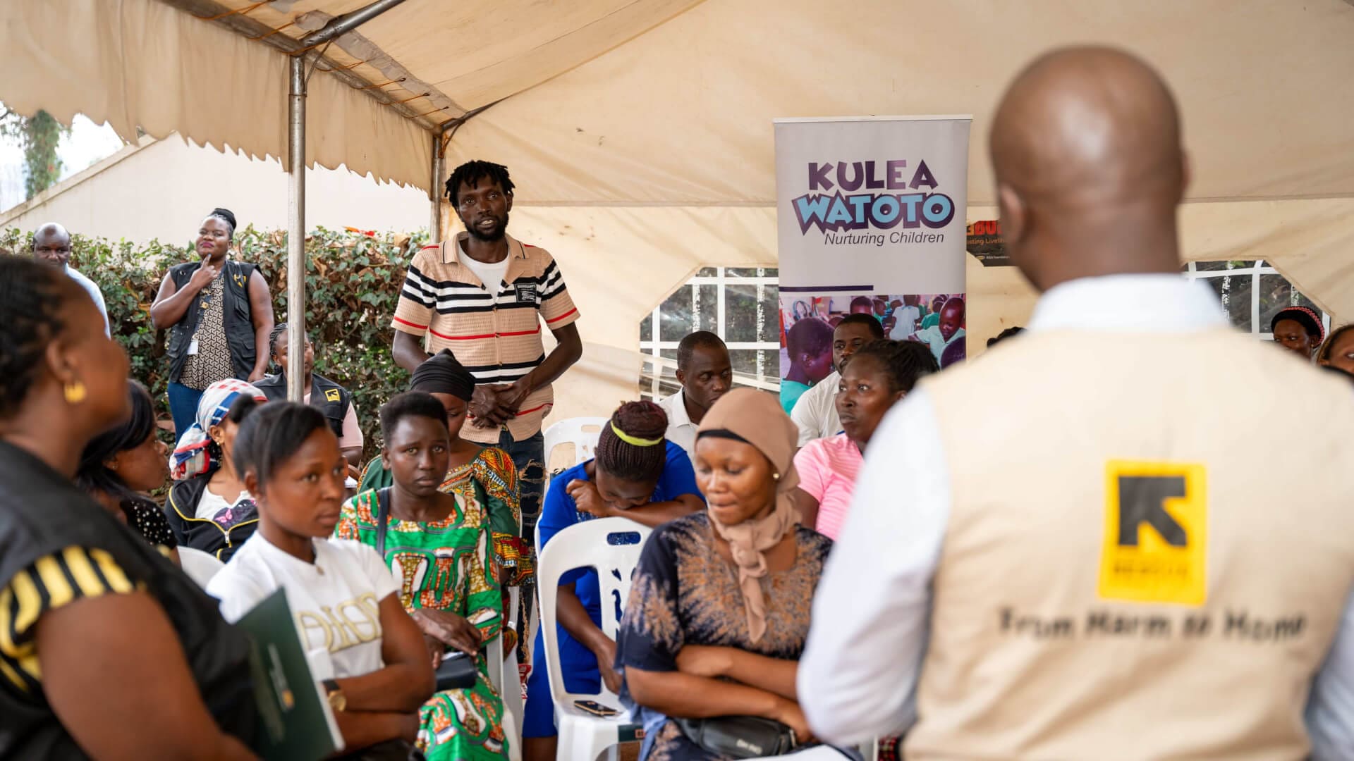 IRC Country Director listens to a testimony from a client enrolled under the Kulea Watoto project during a recently conducted field visit in Makindye Division, Kampala.