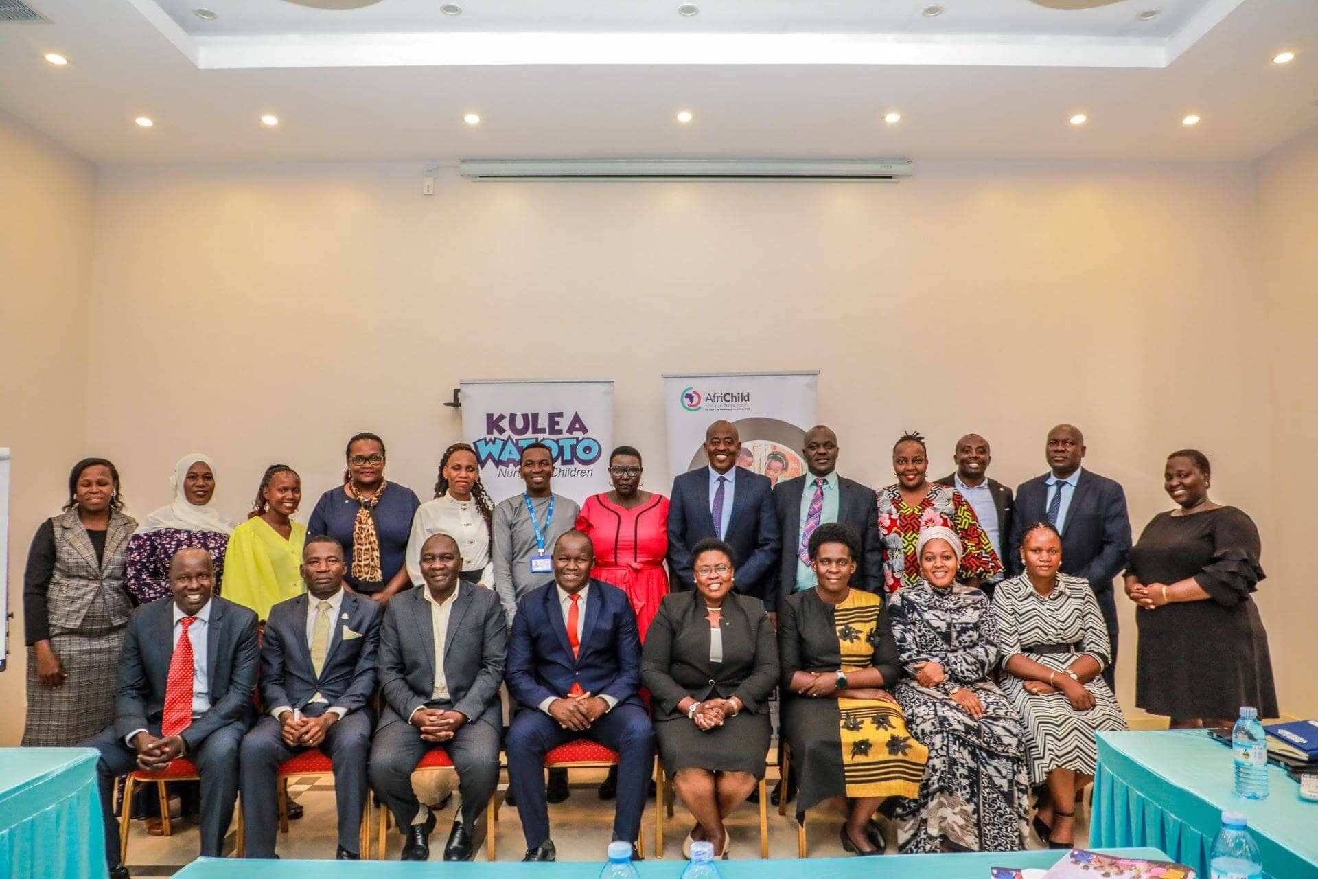 All for Children: Legislators who subscribe to the Parliamentary Forum for Children and staff from the Kulea Watoto Project pose for a group photograph with Hon. Joyce Kaducu (seated fourth from right) after their meeting in Entebbe