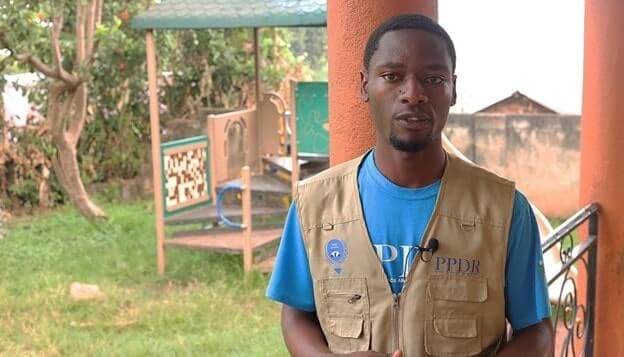 David Lungu, trained caregiver, during an interview at PPDR play-space supported by the Kulea Watoto Project in Lukuli, Makindye division